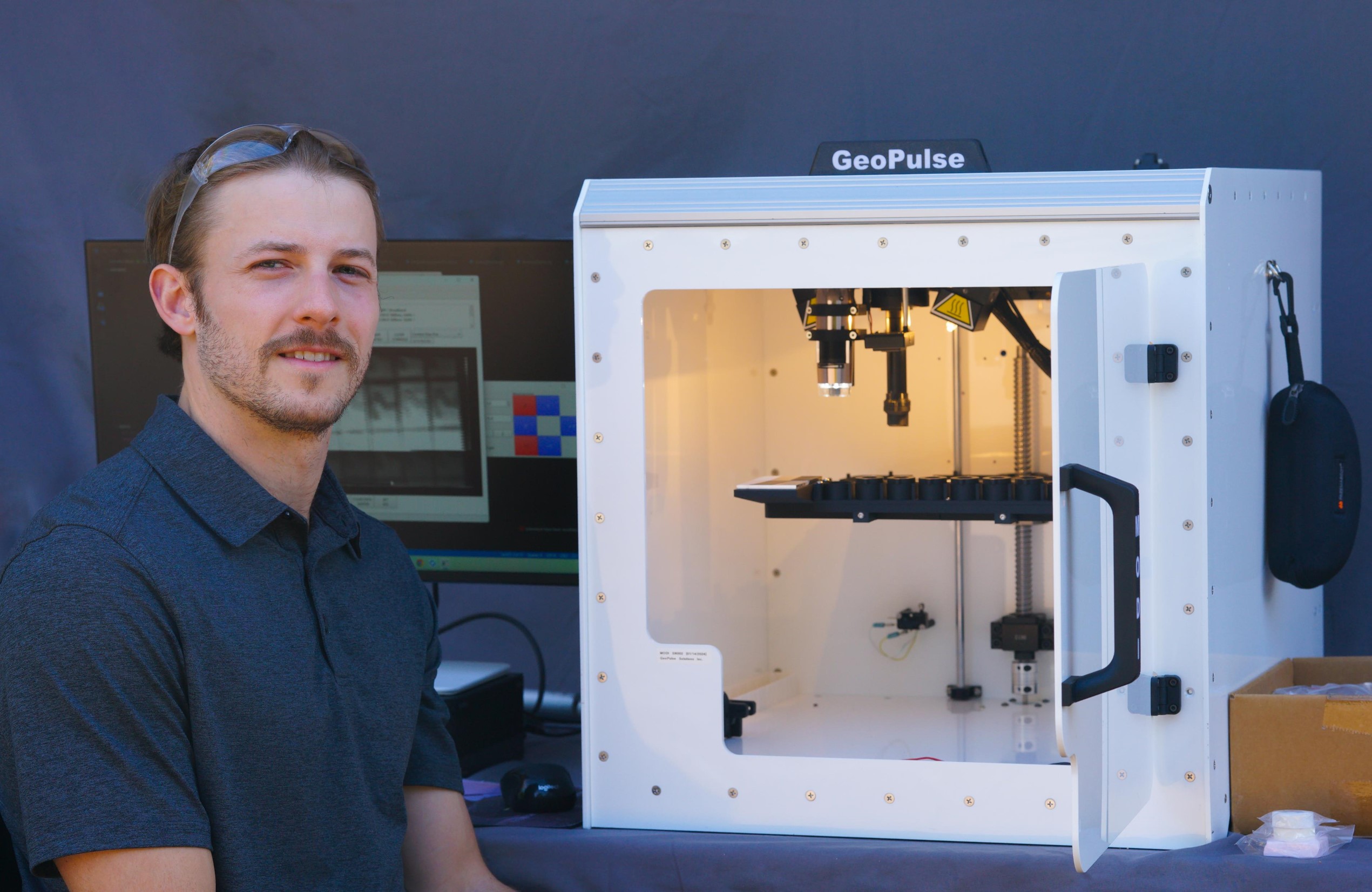 a man in front of a scanning device